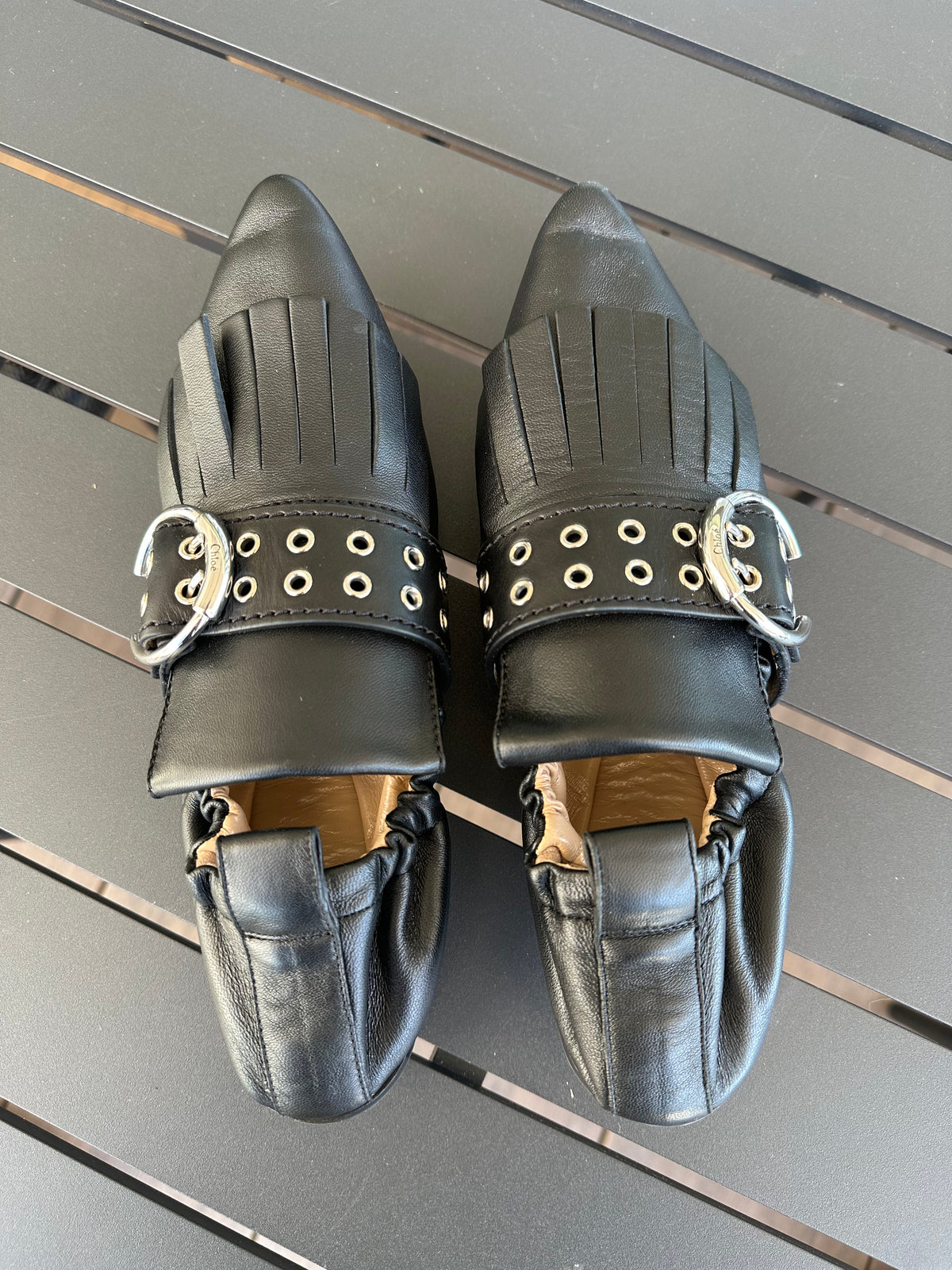 Chloe Pointed Fringe Loafers in Black Leather