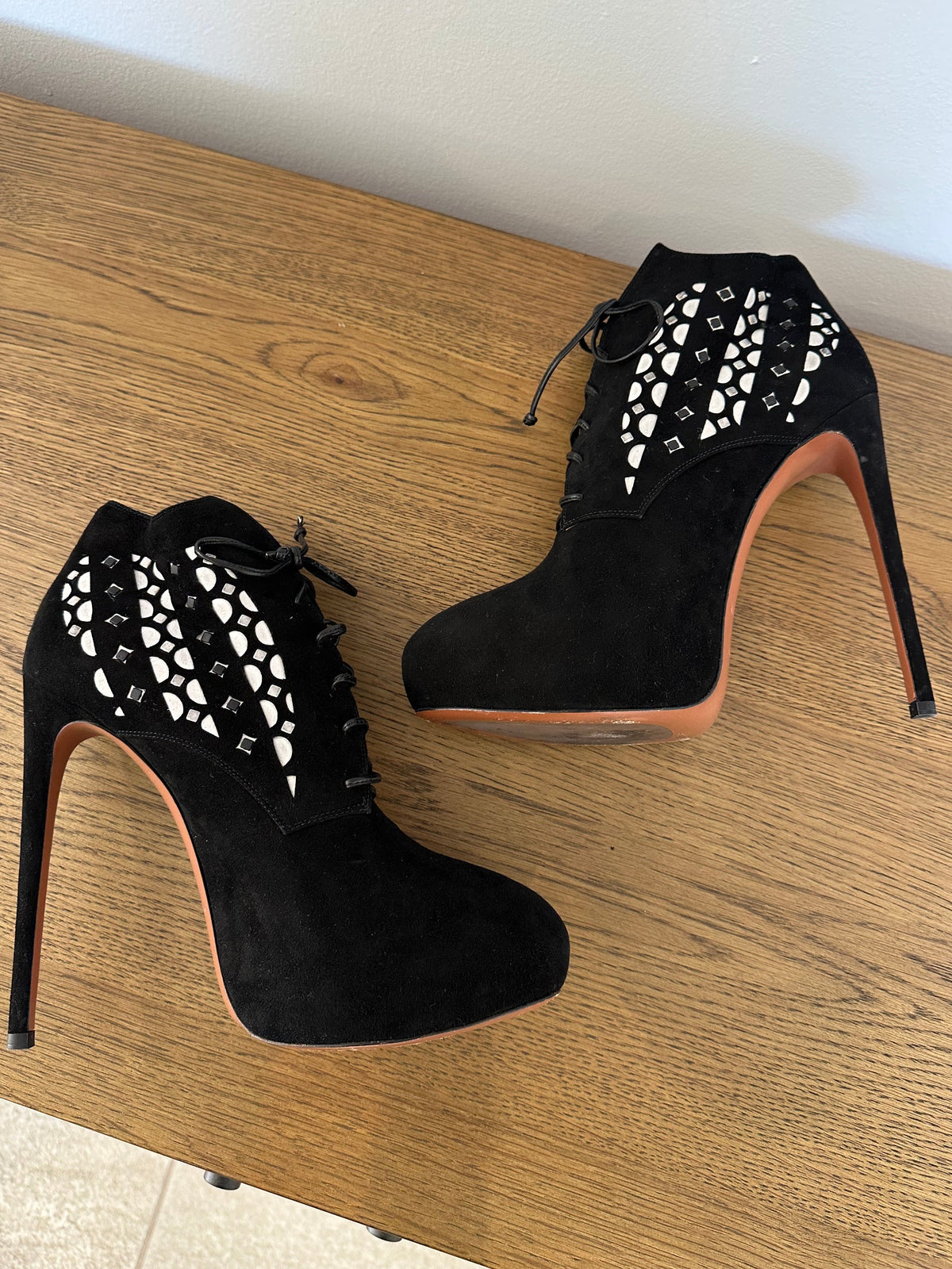 Alaïa Lace-up Heels in Black Suede