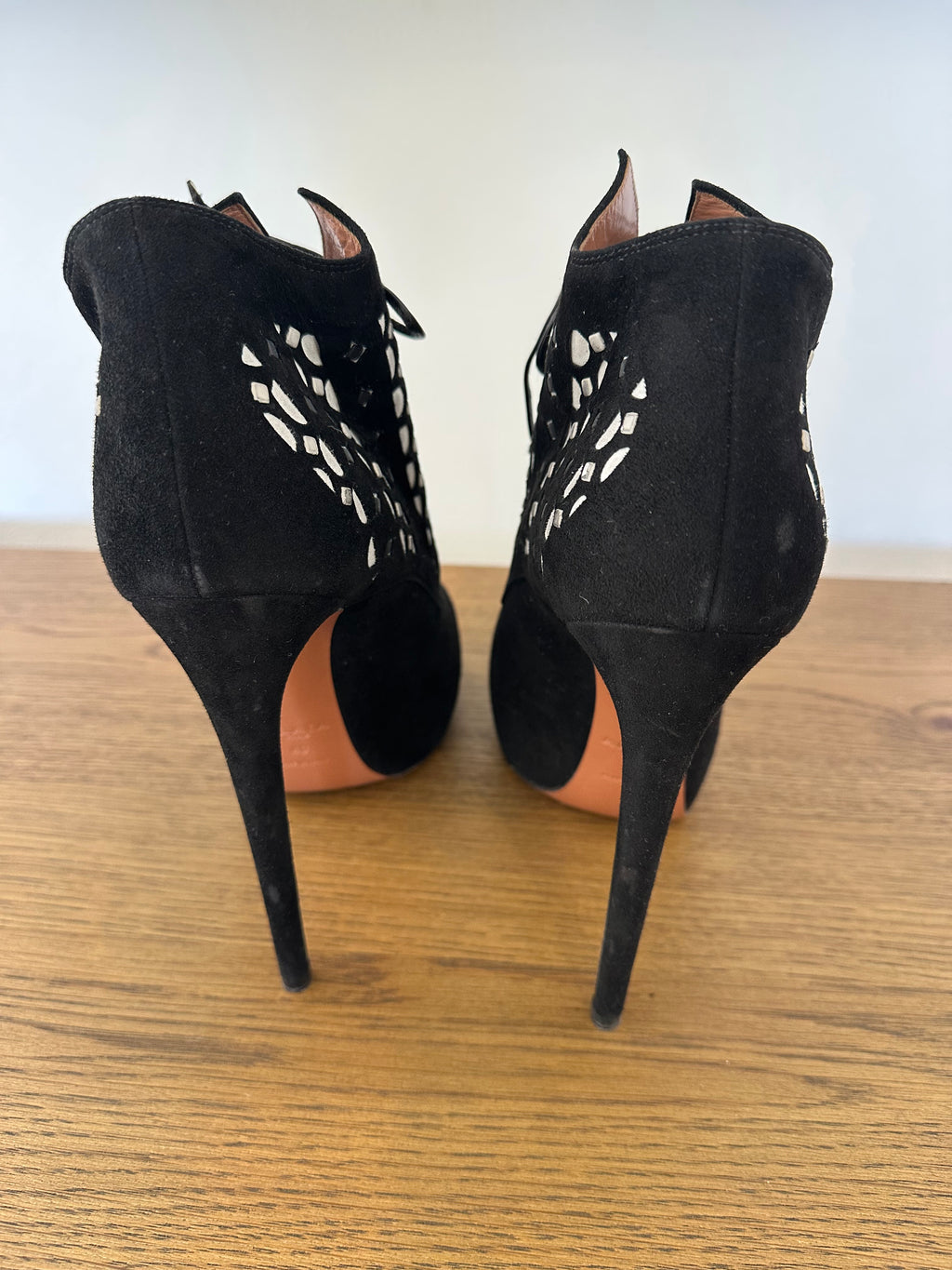 Alaïa Lace-up Heels in Black Suede